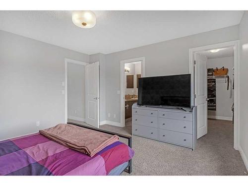 58 Cranberry Mews Se, Calgary, AB - Indoor Photo Showing Bedroom