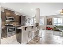 58 Cranberry Mews Se, Calgary, AB  - Indoor Photo Showing Kitchen With Stainless Steel Kitchen With Upgraded Kitchen 