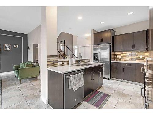 58 Cranberry Mews Se, Calgary, AB - Indoor Photo Showing Kitchen With Double Sink