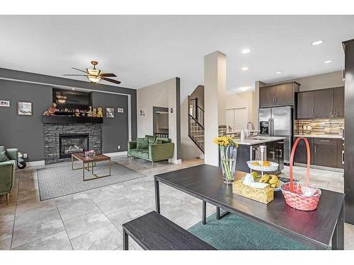 58 Cranberry Mews Se, Calgary, AB - Indoor Photo Showing Living Room With Fireplace