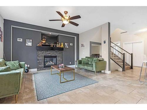 58 Cranberry Mews Se, Calgary, AB - Indoor Photo Showing Living Room With Fireplace