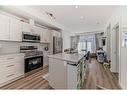 2311-55 Lucas Way Nw, Calgary, AB  - Indoor Photo Showing Kitchen 