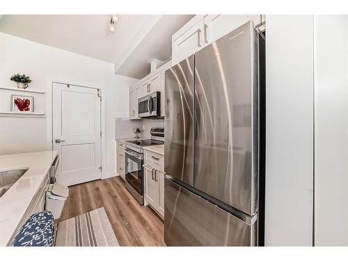 2311-55 Lucas Way Nw, Calgary, AB - Indoor Photo Showing Kitchen