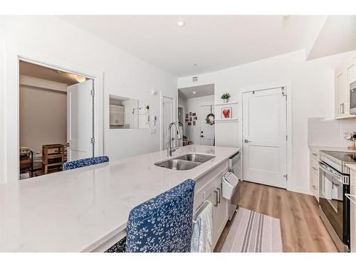 2311-55 Lucas Way Nw, Calgary, AB - Indoor Photo Showing Kitchen With Double Sink