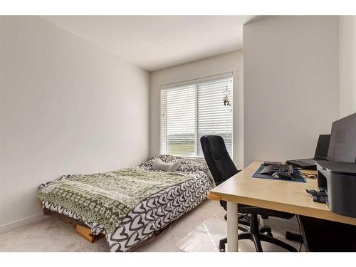 988 Sherwood Boulevard Nw, Calgary, AB - Indoor Photo Showing Bedroom