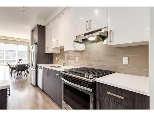 988 Sherwood Boulevard Nw, Calgary, AB - Indoor Photo Showing Kitchen With Upgraded Kitchen