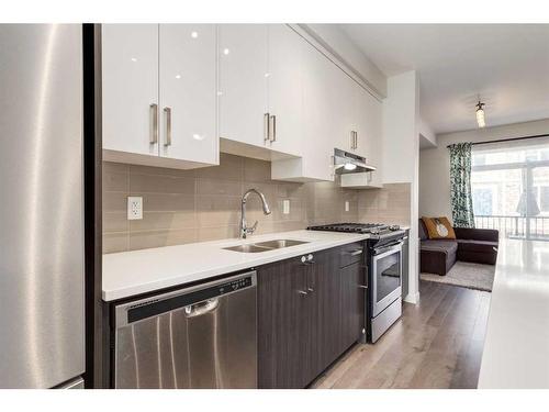 988 Sherwood Boulevard Nw, Calgary, AB - Indoor Photo Showing Kitchen With Double Sink With Upgraded Kitchen