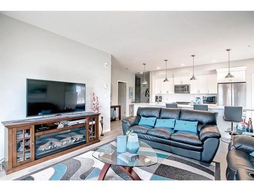 130-20 Seton Park Se, Calgary, AB - Indoor Photo Showing Living Room