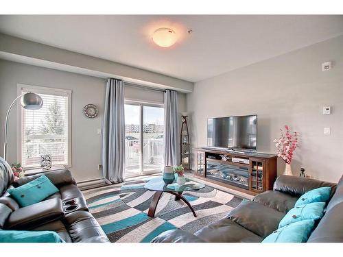 130-20 Seton Park Se, Calgary, AB - Indoor Photo Showing Living Room