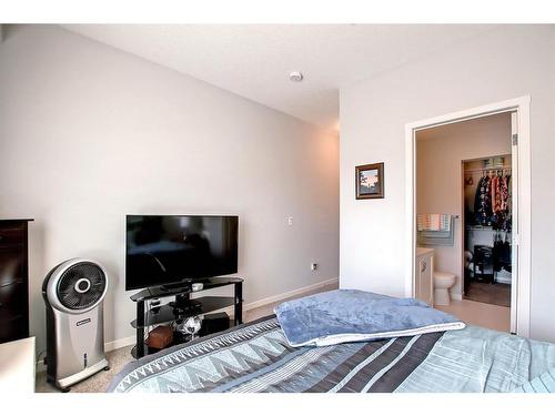 130-20 Seton Park Se, Calgary, AB - Indoor Photo Showing Bedroom