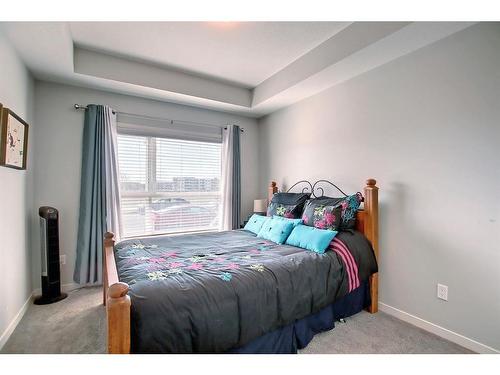 130-20 Seton Park Se, Calgary, AB - Indoor Photo Showing Bedroom