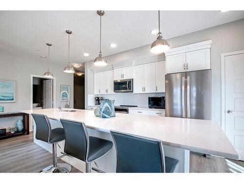 130-20 Seton Park Se, Calgary, AB - Indoor Photo Showing Kitchen With Stainless Steel Kitchen With Upgraded Kitchen