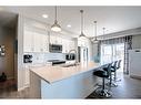 130-20 Seton Park Se, Calgary, AB  - Indoor Photo Showing Kitchen With Stainless Steel Kitchen With Double Sink With Upgraded Kitchen 