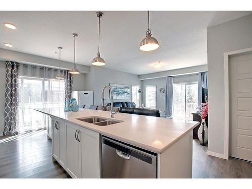 130-20 Seton Park Se, Calgary, AB - Indoor Photo Showing Kitchen With Double Sink With Upgraded Kitchen