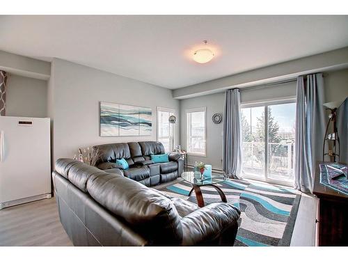 130-20 Seton Park Se, Calgary, AB - Indoor Photo Showing Living Room