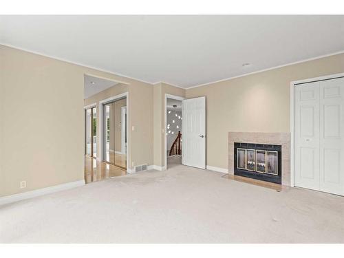 32 Patterson Crescent Sw, Calgary, AB - Indoor With Fireplace