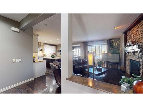 943 Auburn Bay Boulevard Se, Calgary, AB - Indoor With Fireplace