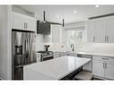 1315 105 Avenue Sw, Calgary, AB  - Indoor Photo Showing Kitchen With Upgraded Kitchen 