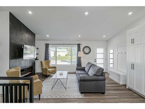 1315 105 Avenue Sw, Calgary, AB - Indoor Photo Showing Living Room With Fireplace