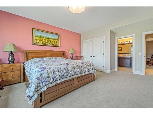 42 Waters Edge Drive, Heritage Pointe, AB - Indoor Photo Showing Bedroom