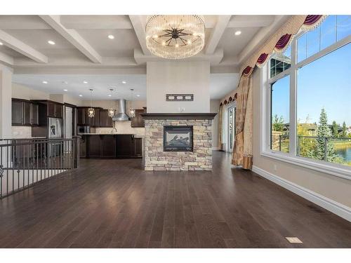 42 Waters Edge Drive, Heritage Pointe, AB - Indoor Photo Showing Other Room With Fireplace