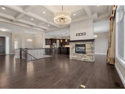 42 Waters Edge Drive, Heritage Pointe, AB - Indoor Photo Showing Living Room With Fireplace