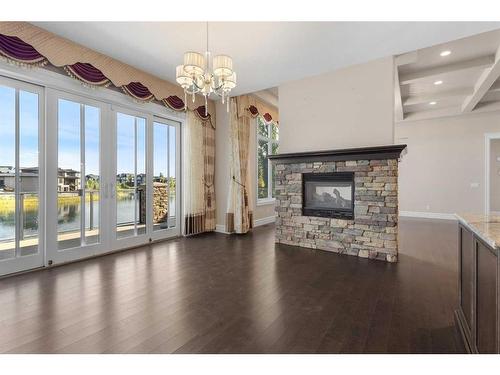 42 Waters Edge Drive, Heritage Pointe, AB - Indoor Photo Showing Living Room With Fireplace