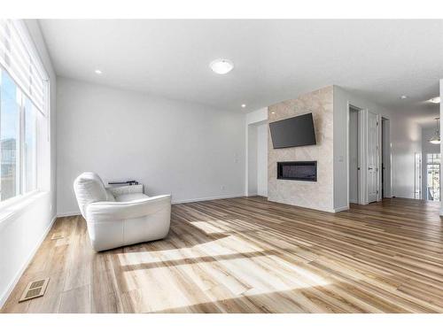 227 Carringham Road Nw, Calgary, AB - Indoor Photo Showing Other Room With Fireplace