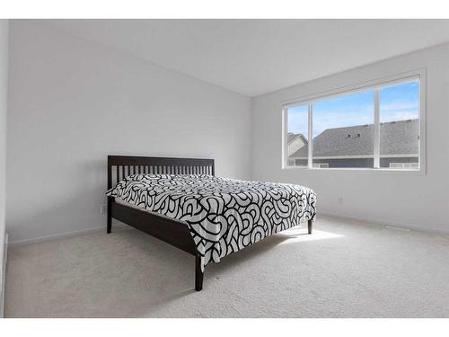 227 Carringham Road Nw, Calgary, AB - Indoor Photo Showing Bedroom