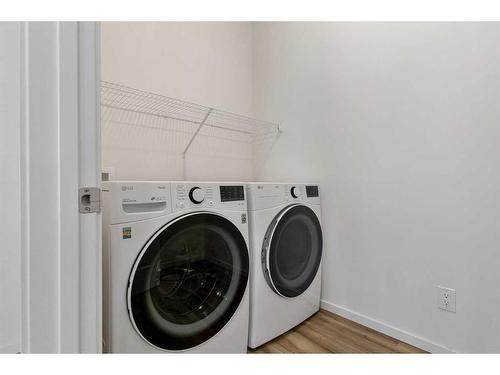 227 Carringham Road Nw, Calgary, AB - Indoor Photo Showing Laundry Room