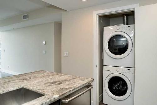 1505-519 Riverfront Avenue Se, Calgary, AB - Indoor Photo Showing Laundry Room