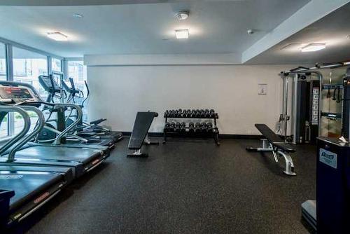 1505-519 Riverfront Avenue Se, Calgary, AB - Indoor Photo Showing Gym Room