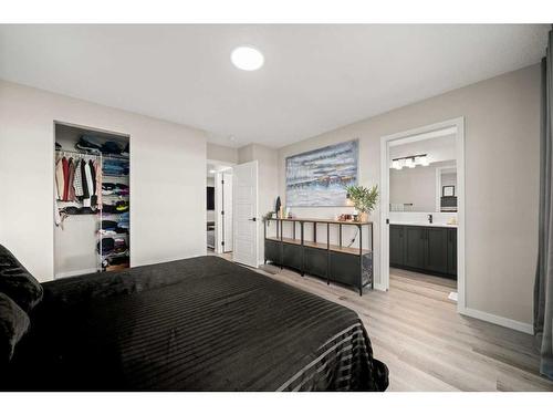 125 Dawson Drive, Chestermere, AB - Indoor Photo Showing Bedroom