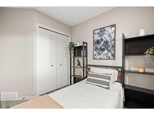 125 Dawson Drive, Chestermere, AB - Indoor Photo Showing Bedroom