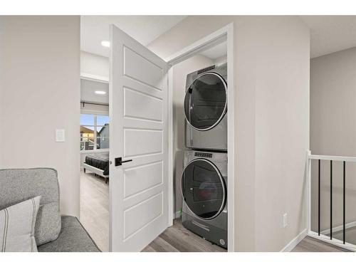 125 Dawson Drive, Chestermere, AB - Indoor Photo Showing Laundry Room