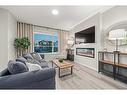 125 Dawson Drive, Chestermere, AB  - Indoor Photo Showing Living Room With Fireplace 