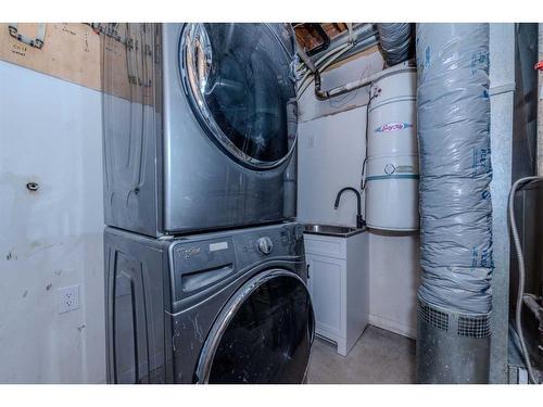 40 Patterson Rise Sw, Calgary, AB - Indoor Photo Showing Laundry Room