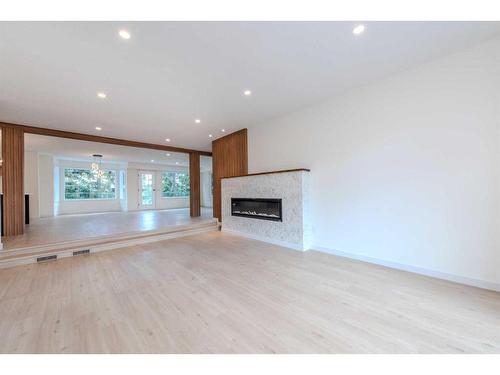 40 Patterson Rise Sw, Calgary, AB - Indoor Photo Showing Living Room With Fireplace