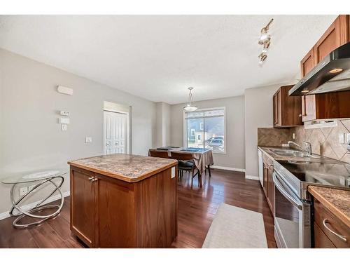 953 Taradale Drive Ne, Calgary, AB - Indoor Photo Showing Kitchen With Double Sink