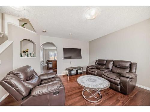 953 Taradale Drive Ne, Calgary, AB - Indoor Photo Showing Living Room