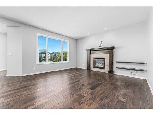 34 Panton Bay Nw, Calgary, AB - Indoor Photo Showing Living Room With Fireplace