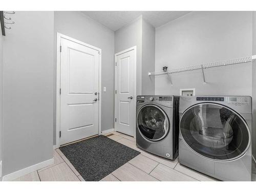 34 Panton Bay Nw, Calgary, AB - Indoor Photo Showing Laundry Room