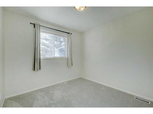 198 Panatella Park Nw, Calgary, AB - Indoor Photo Showing Other Room