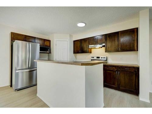 198 Panatella Park Nw, Calgary, AB - Indoor Photo Showing Kitchen