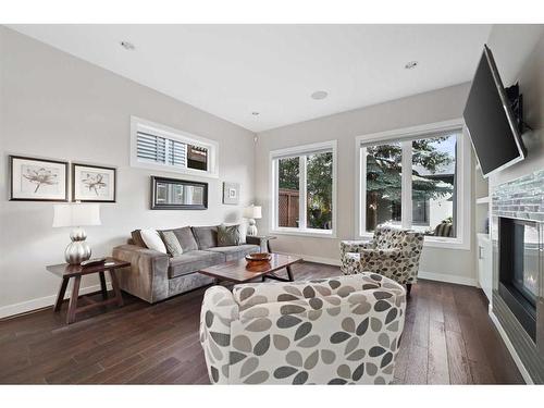 2234 27 Street Sw, Calgary, AB - Indoor Photo Showing Living Room With Fireplace