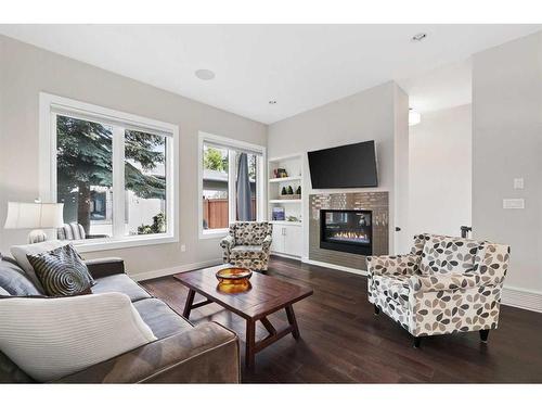 2234 27 Street Sw, Calgary, AB - Indoor Photo Showing Living Room With Fireplace