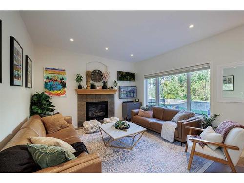 44 Tuscany Ridge Green, Calgary, AB - Indoor Photo Showing Living Room With Fireplace