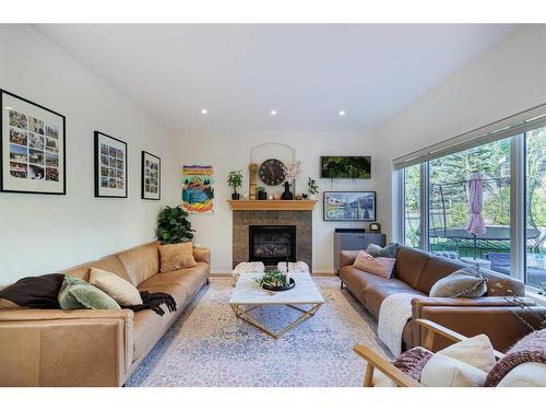 44 Tuscany Ridge Green, Calgary, AB - Indoor Photo Showing Living Room With Fireplace