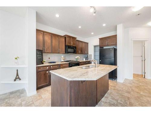 58 Sage Berry Way Nw, Calgary, AB - Indoor Photo Showing Kitchen With Double Sink