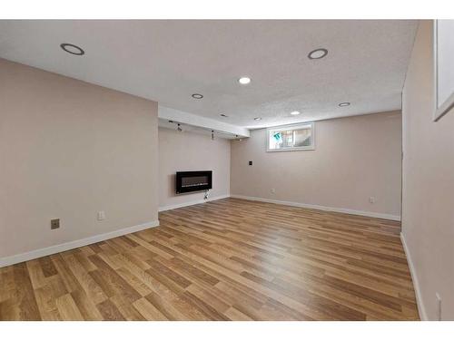 254 Dovercliffe Way Se, Calgary, AB - Indoor With Fireplace